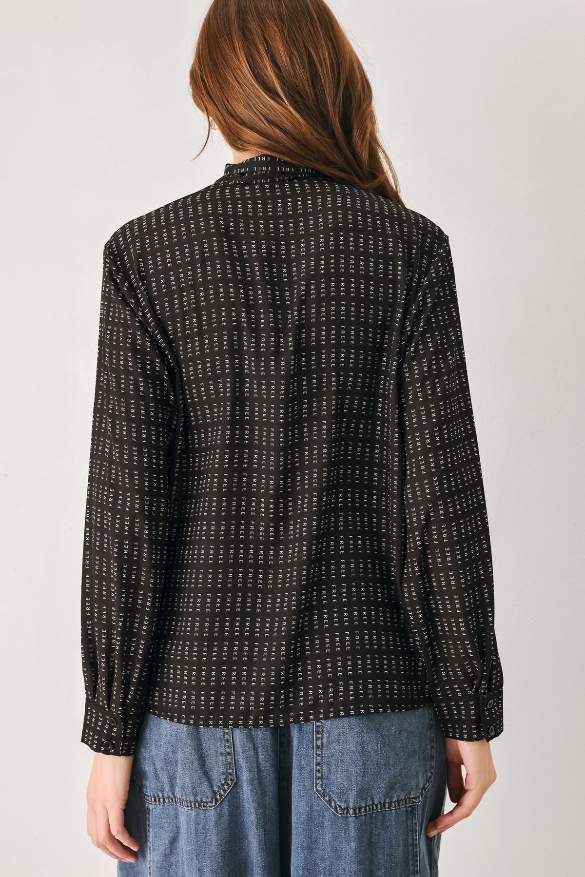 WHEREVER YOU MAY GO WOVEN TOP