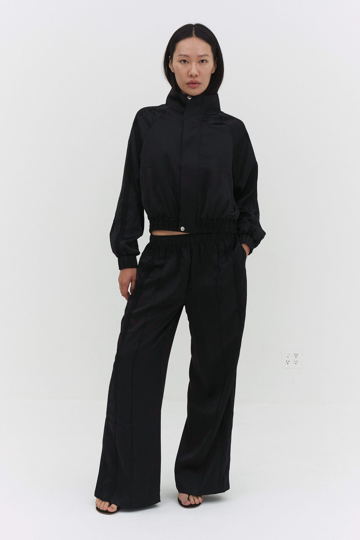 LEISEU TRACK PANTS IN BLACK