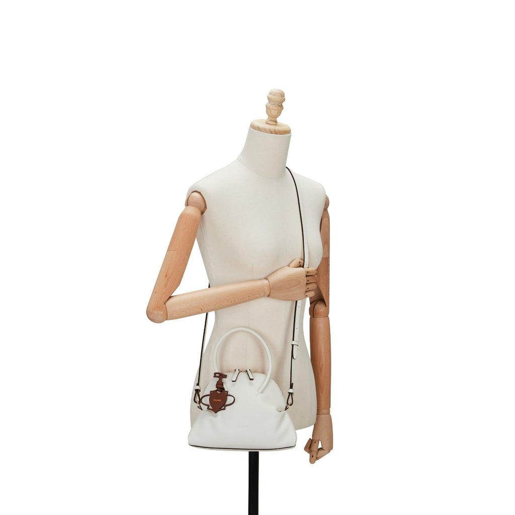 adele mini tote from oryany available color cloud with mannequin