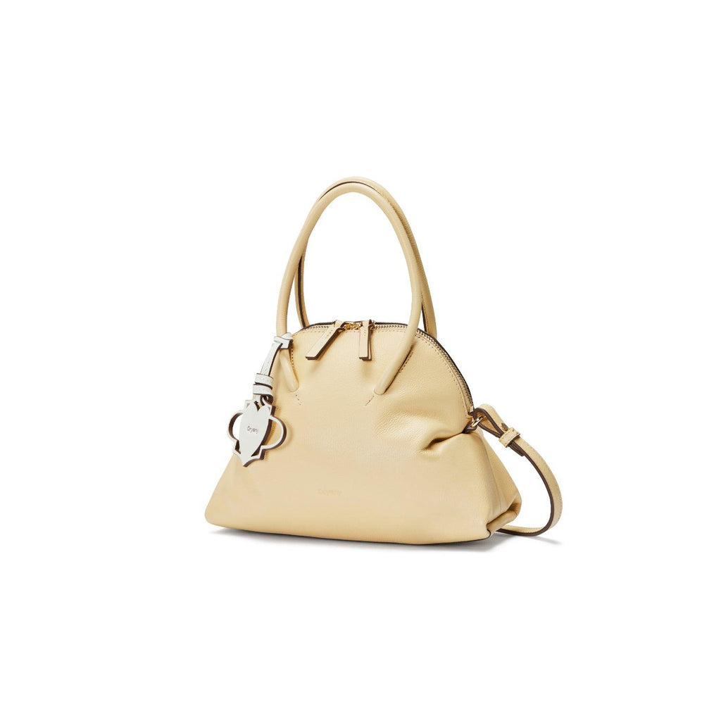 adele mini tote from oryany available color butter cream side view