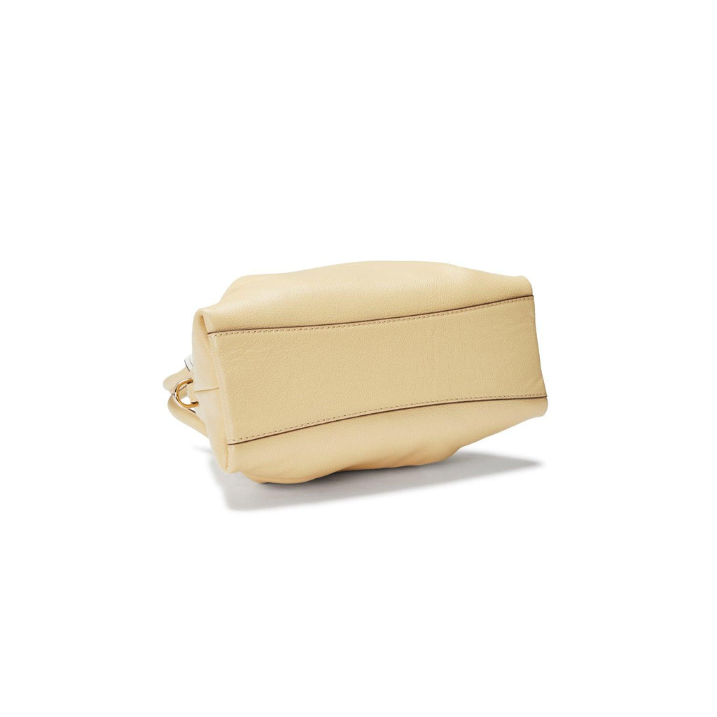 adele mini tote from oryany available color butter cream lower view